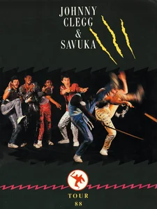 1988,
"Johnny Clegg & Savuka",
Tour 88 : photo avec Renaud + texte.